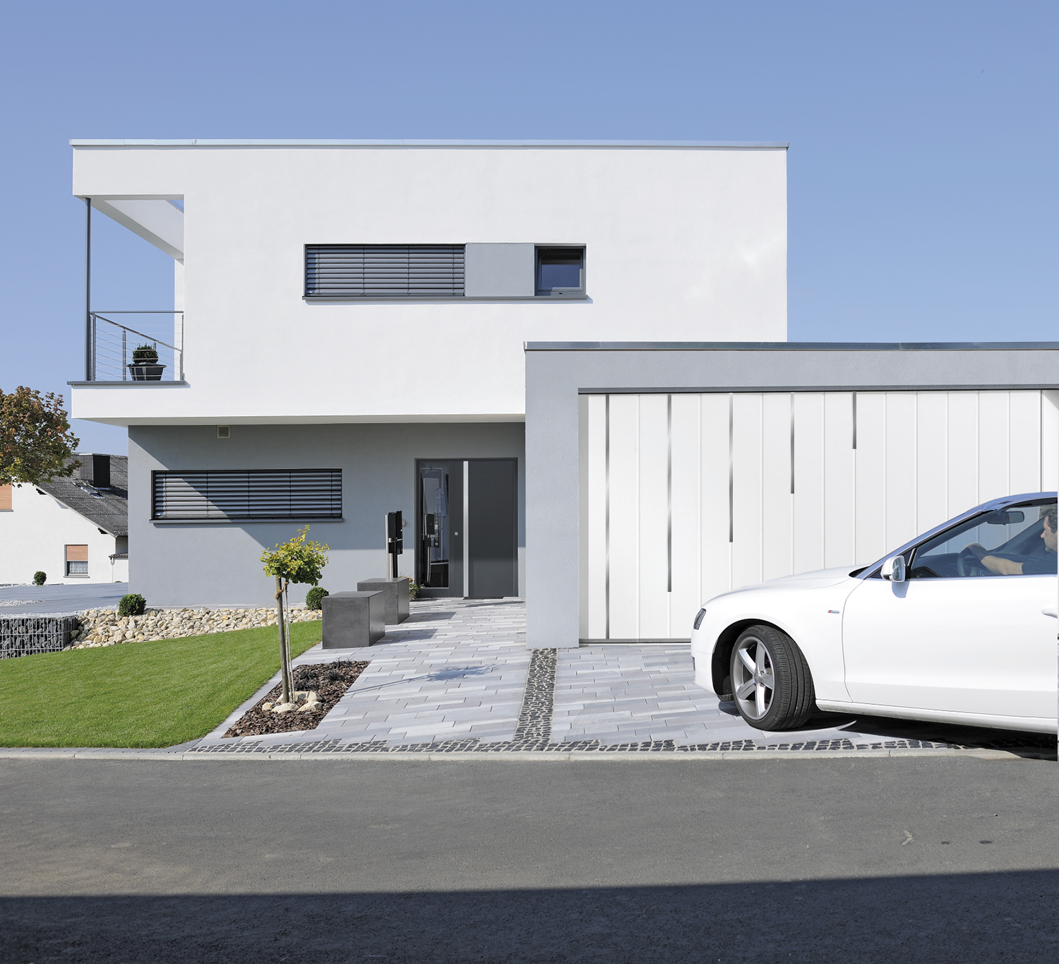 Porte De Garage Sectionnelle Harmonic Isolée 42mm Portes de garage sur-mesure - Fabricant TUBAUTO