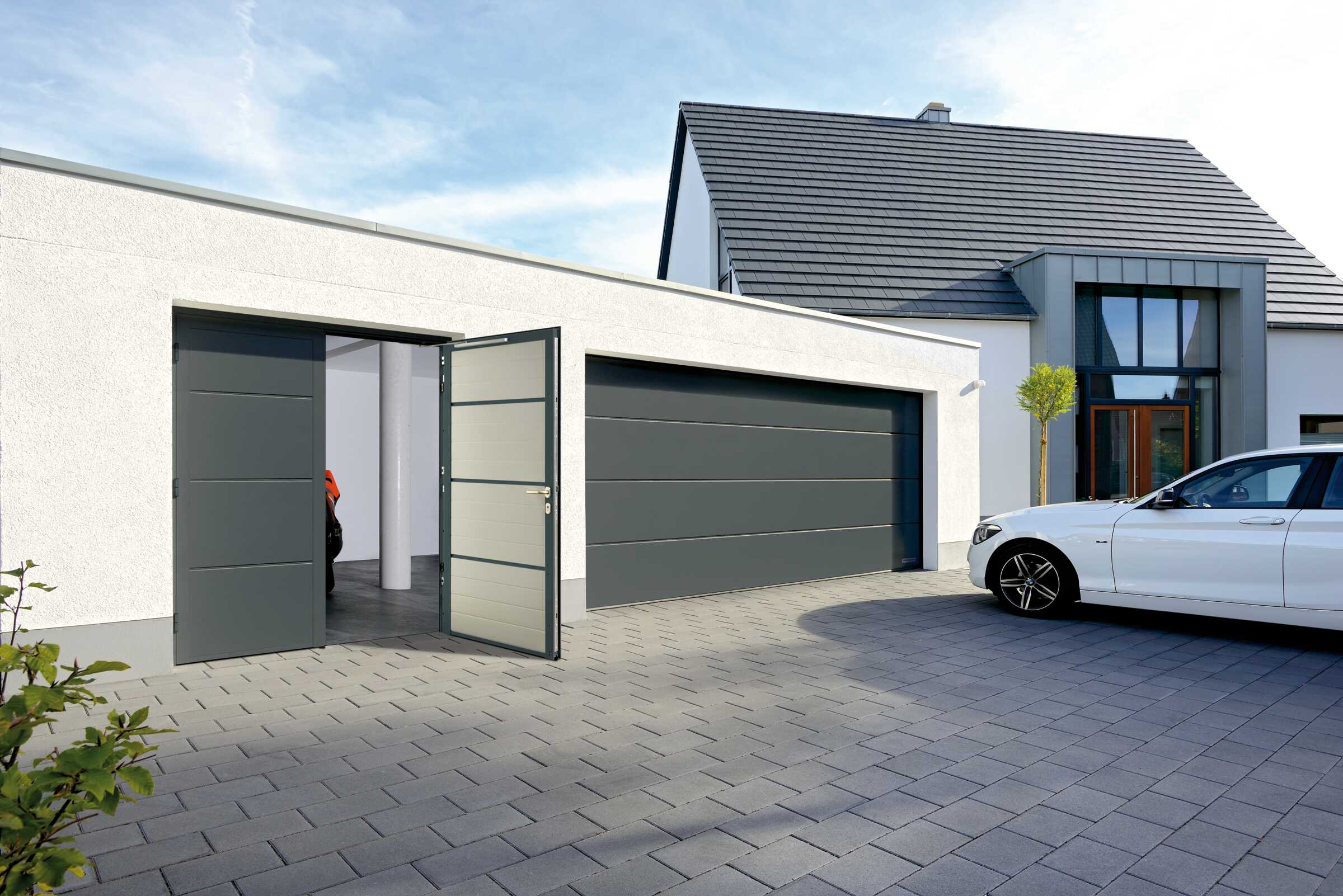 Porte De Garage Sectionnelle Harmonic Isolée 42mm Portes de garage battantes Duomatic - Fabricant TUBAUTO