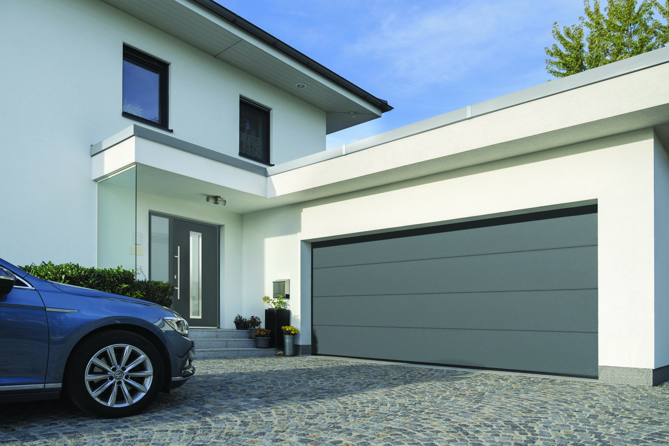 Porte De Garage Sectionnelle Harmonic Isolée 42mm Gamme EuroMatic - Tubauto